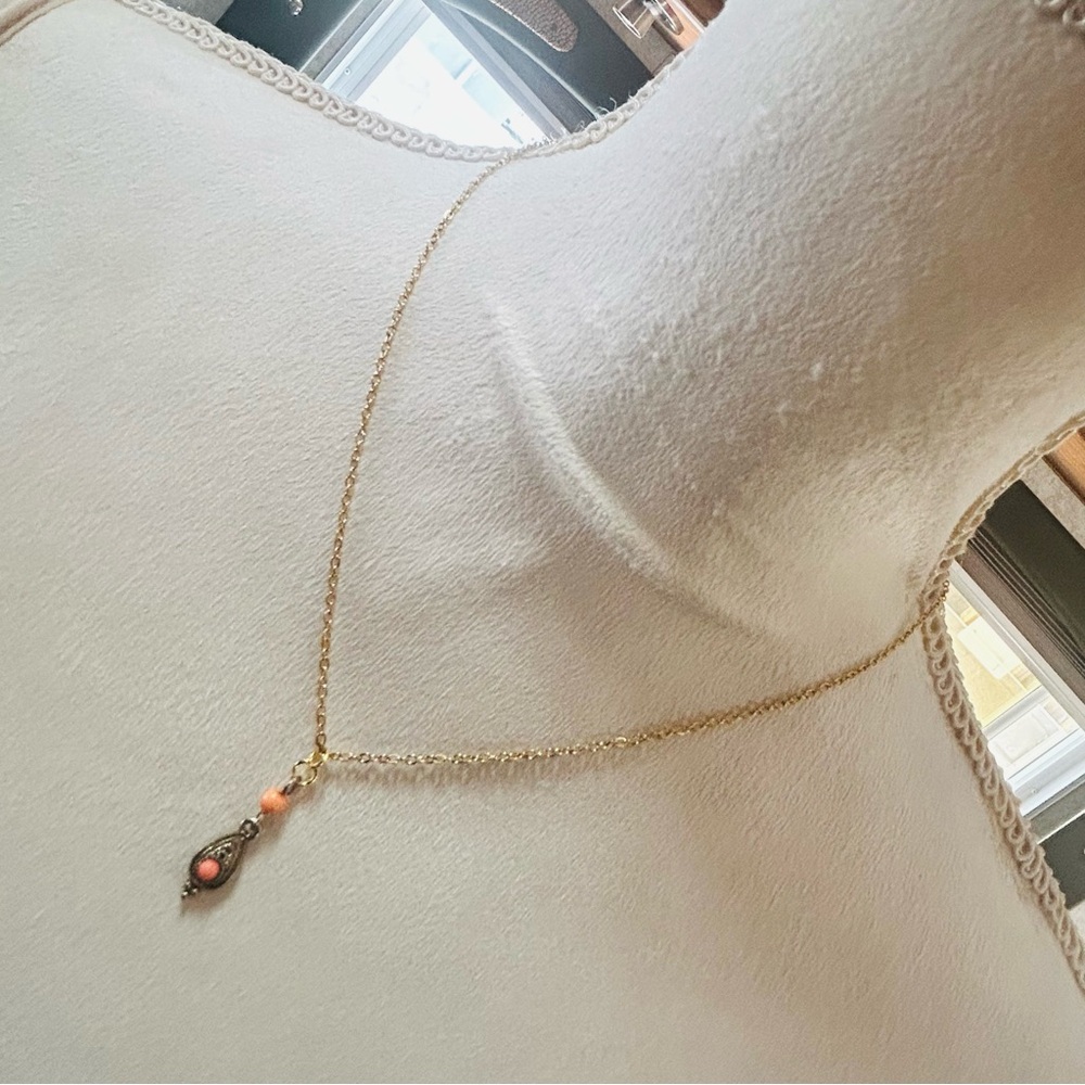 Handcrafted antique gold tone filigree faux coral bead pendant on chain necklace